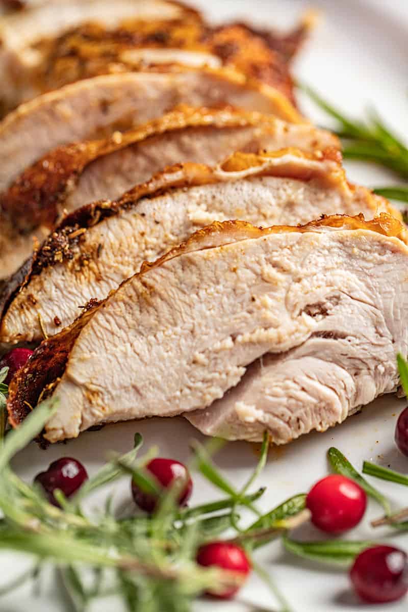 a sliced oven roasted turkey breast.