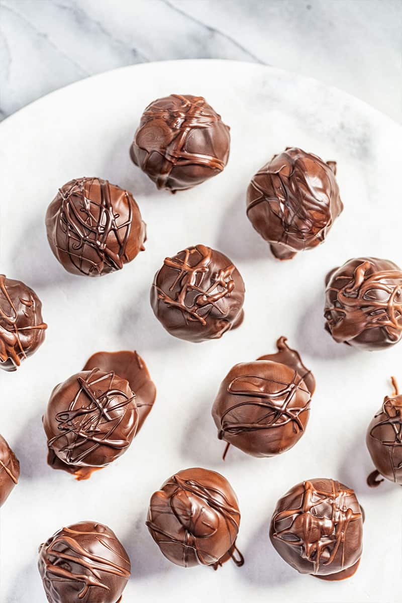 Cookie dough truffles on a plate.