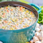 Creamy vegetable soup in a pot.