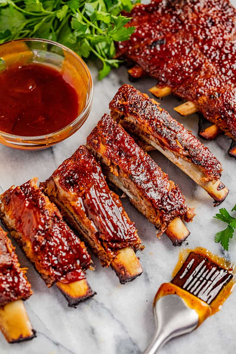 A rack of separated oven baked ribs.