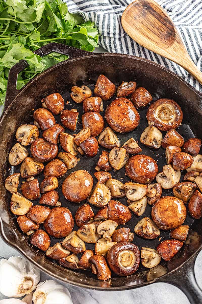 Overhead view of sautéed mushrooms.