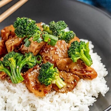 Chicken teriyaki cubed over a bed of white rice.