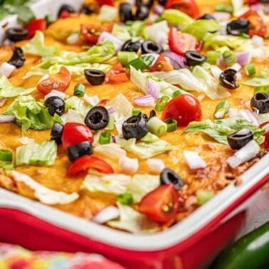 Close up view of tasty taco casserole in a baking dish.