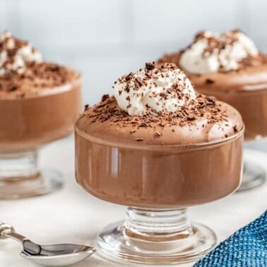 3 small chocolate mousse cups.