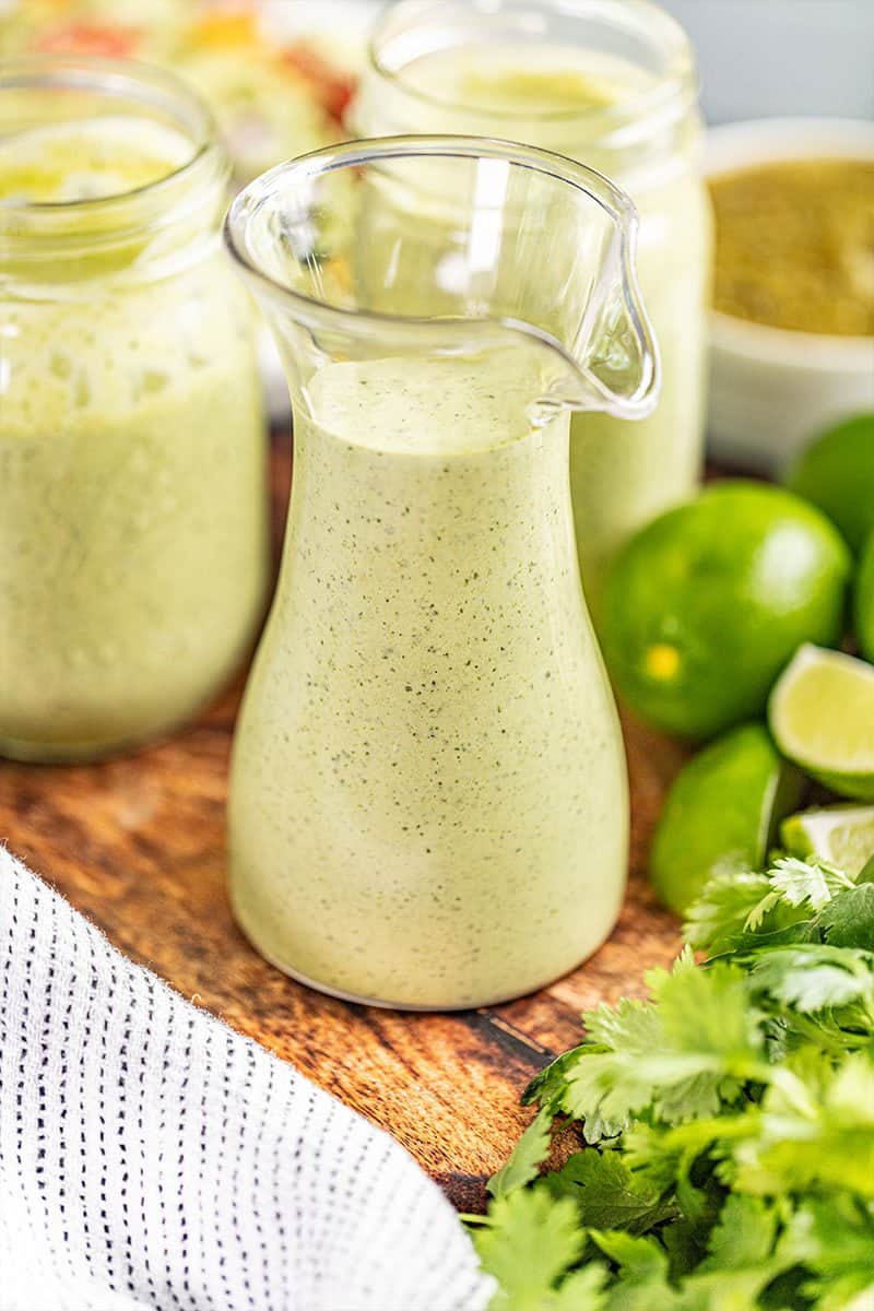 Cilantro lime ranch dressing in a glass bottle.