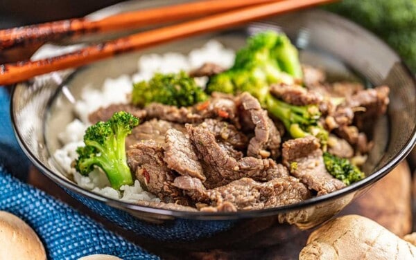 Takeout style beef and broccoli in a dinner bowl.