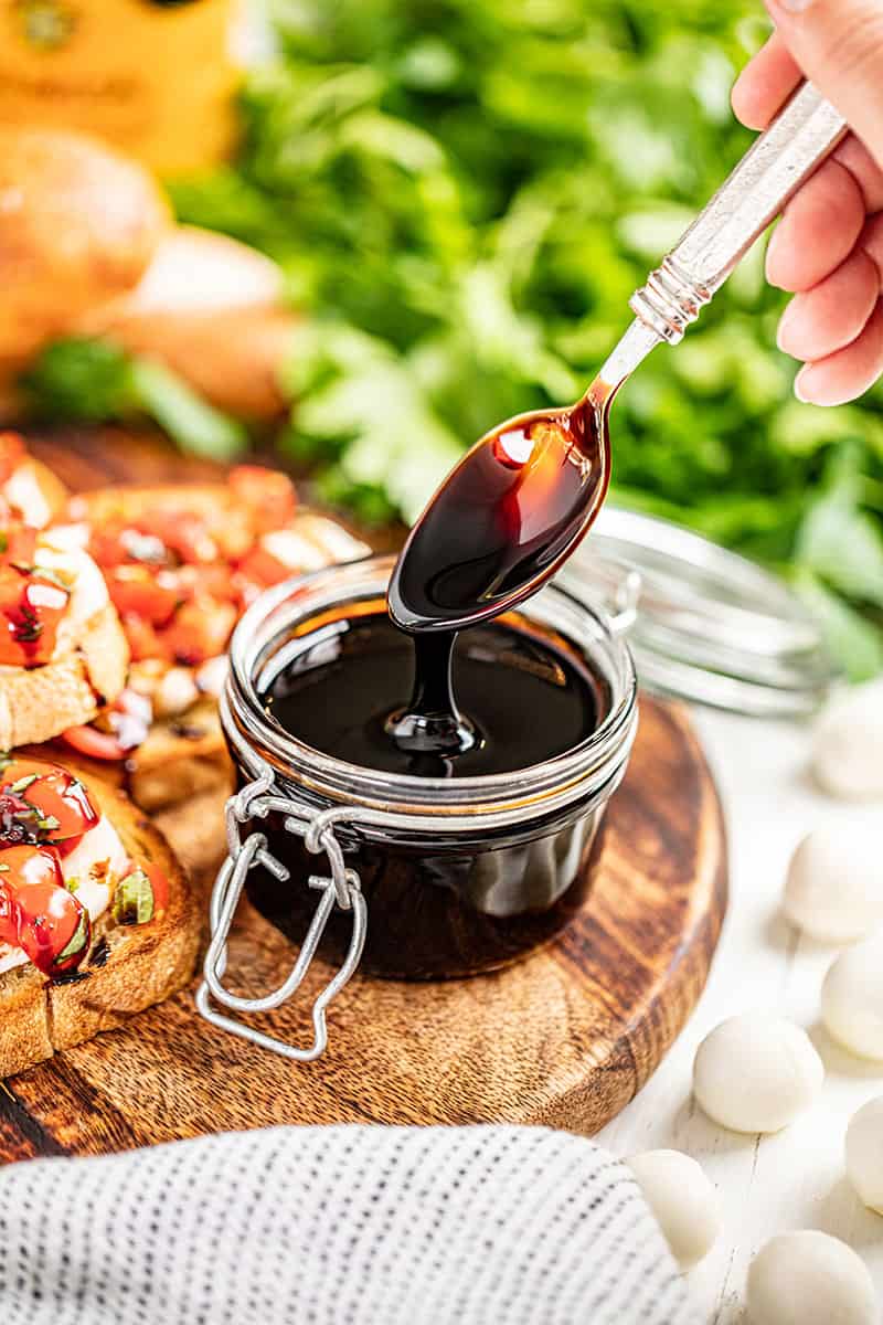 A jar of balsamic glaze in a jar.