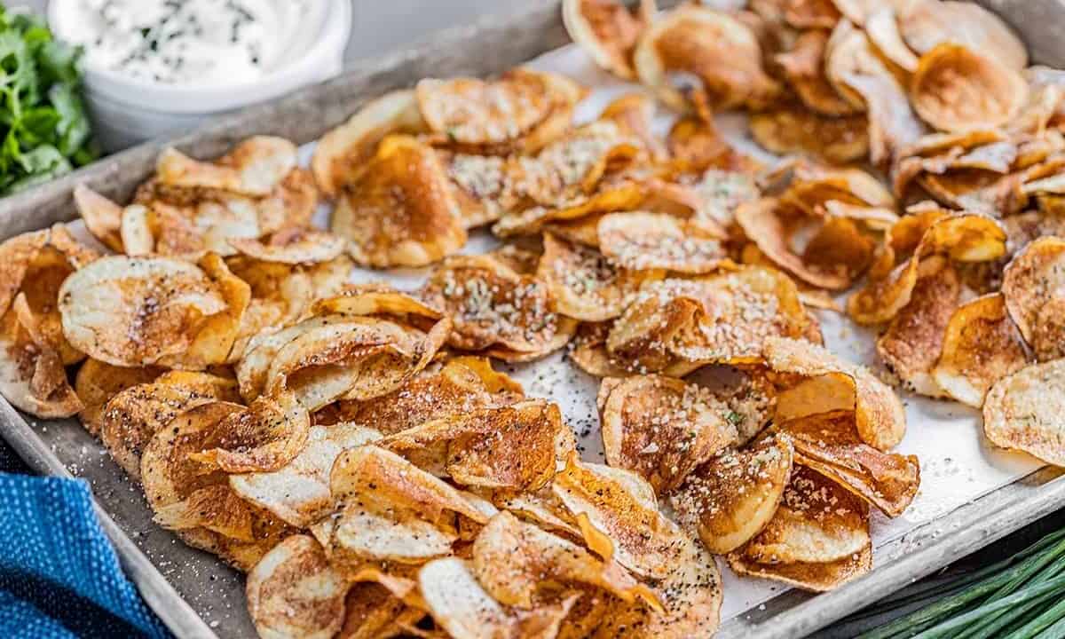 Homemade kettle chips on a sheet pan.