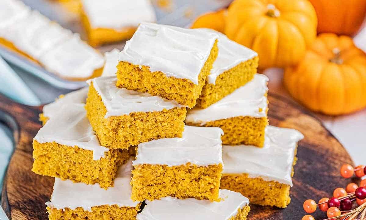 A large stack of pumpkin bars.