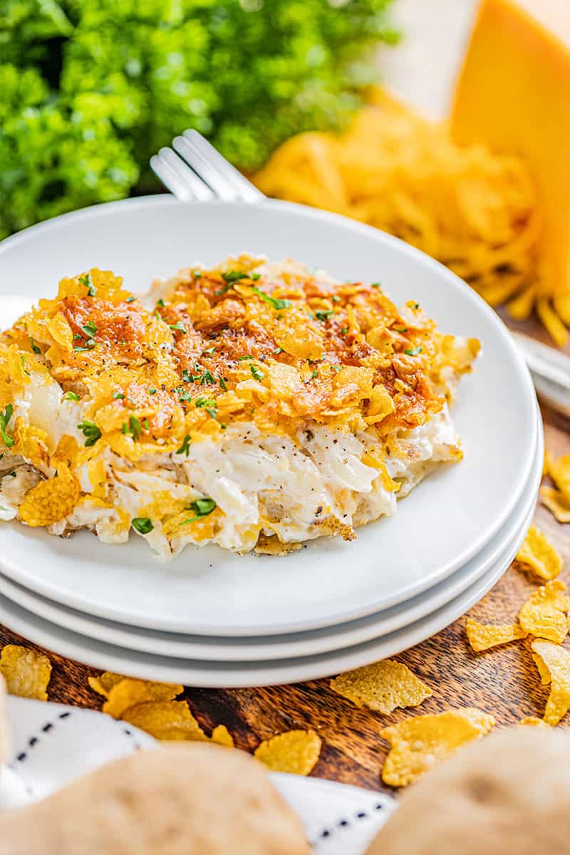 A serving of traditional funeral potatoes on a plate.