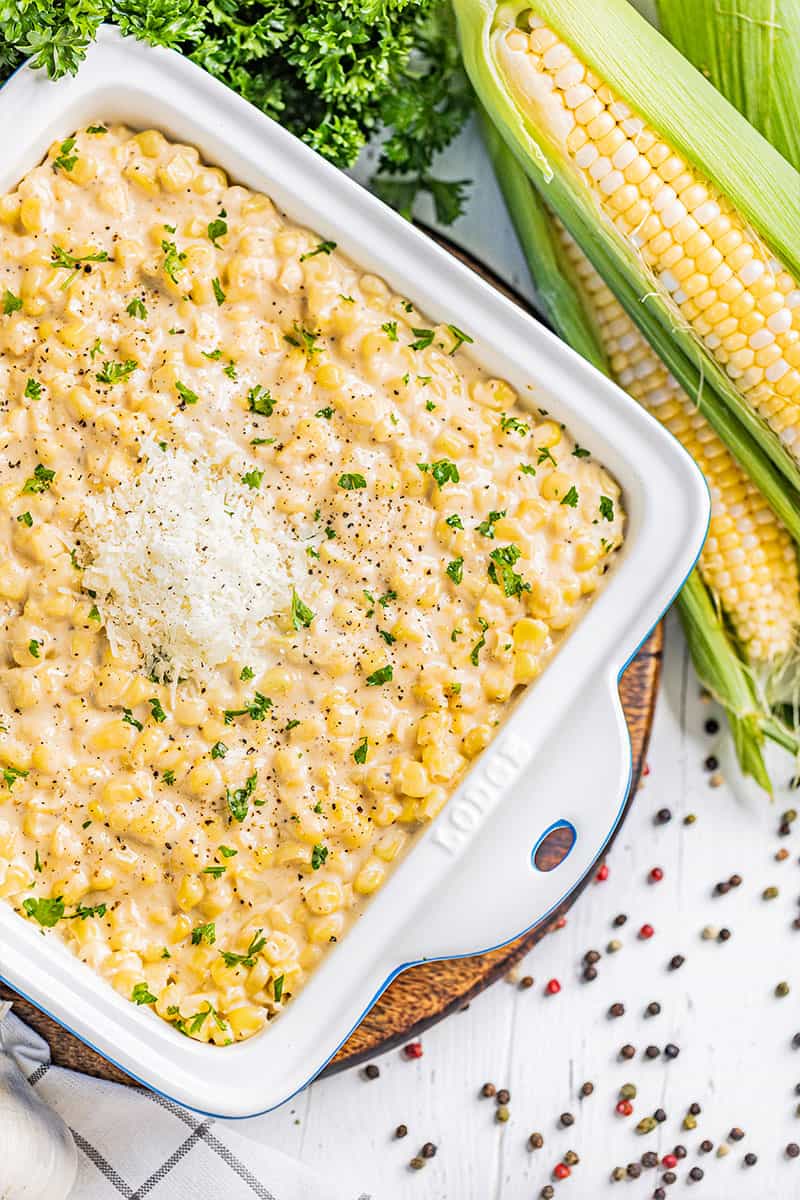 Overhead view of creamed corn in a baking dish.