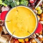Overhead view of a pot of cheese fondue.