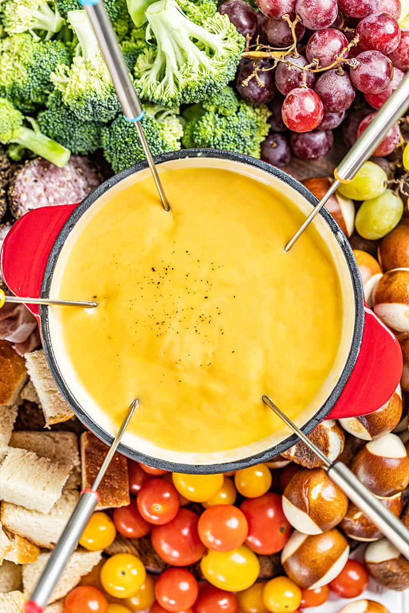 Overhead view of a pot of cheese fondue.