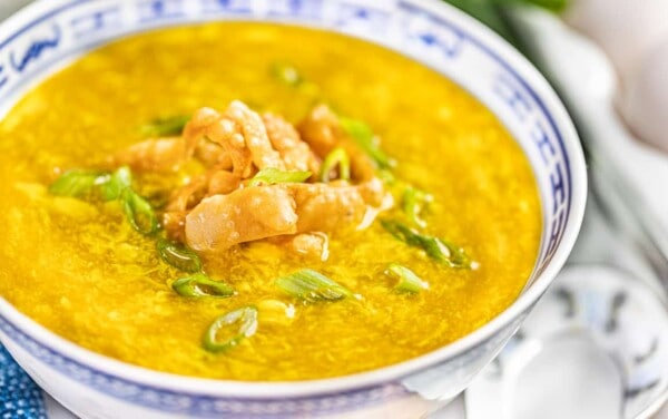 Close up view of a bowl filled with egg drop soup.