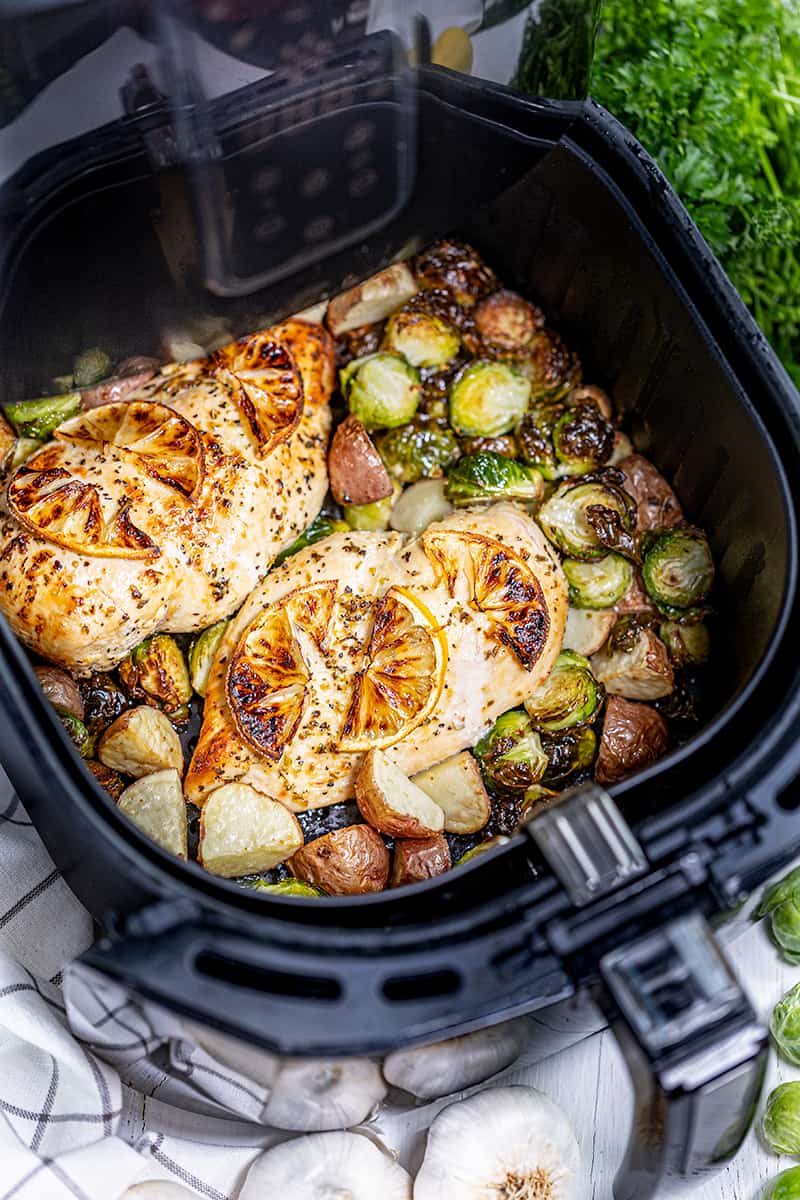 Chicken breasts in an air fryer.