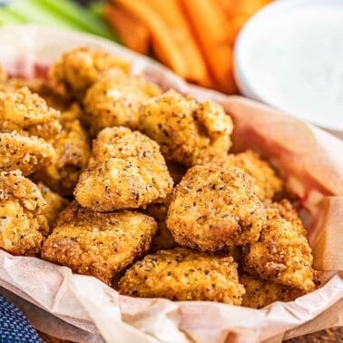 Buffalo chicken bites in a serving bowl.