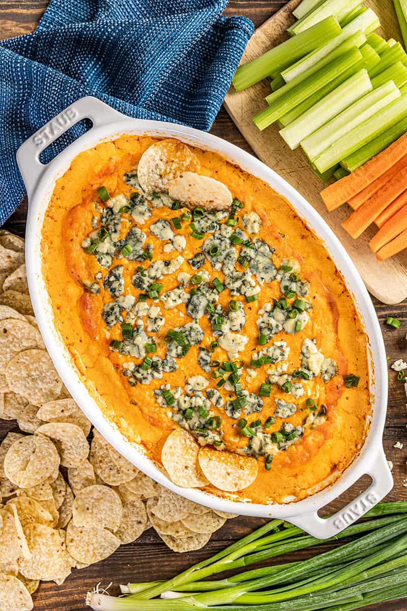 Overhead view of a baking dish filled with buffalo chicken dip.