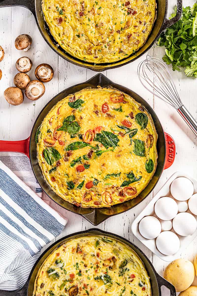 Overhead view of a frittata in a cast iron skillet.