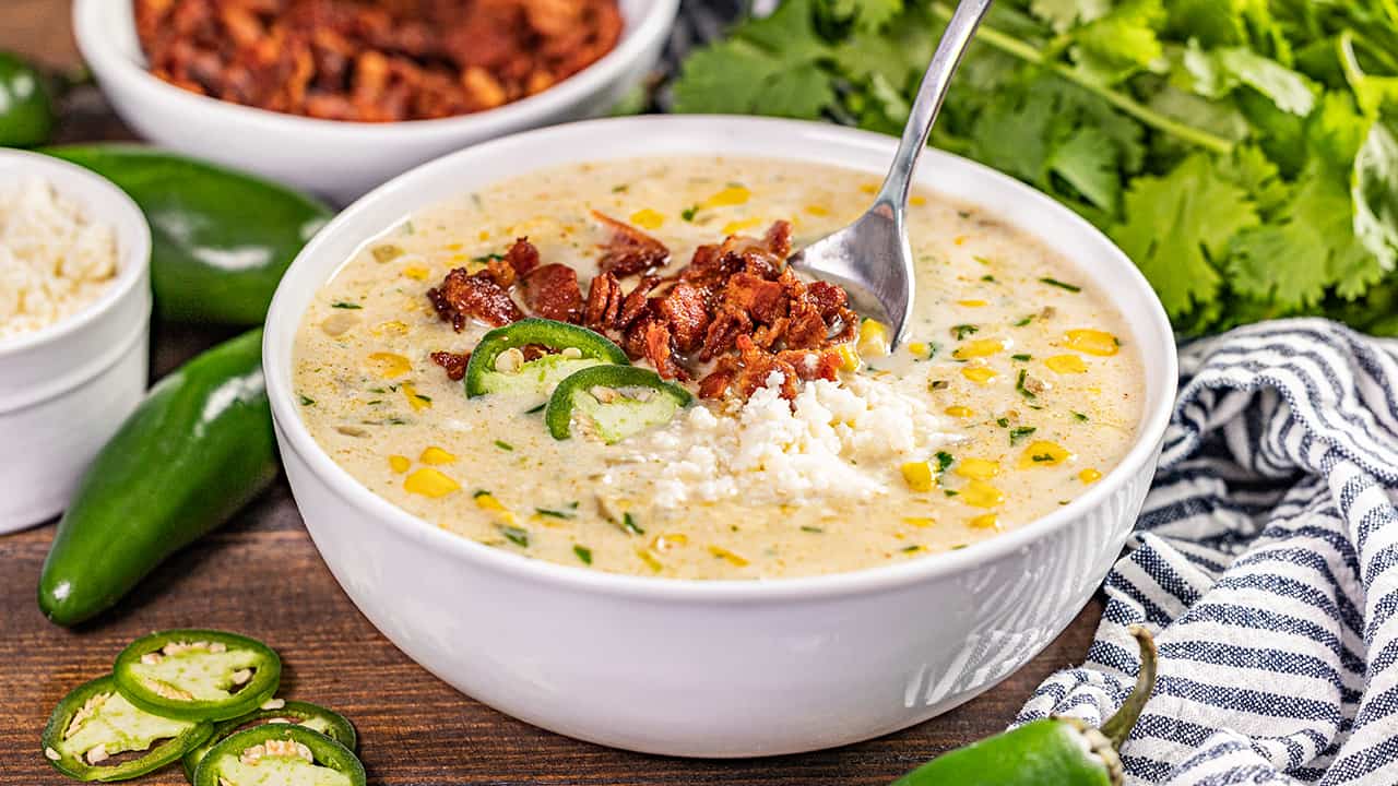 A bowl of Mexican street corn soup.