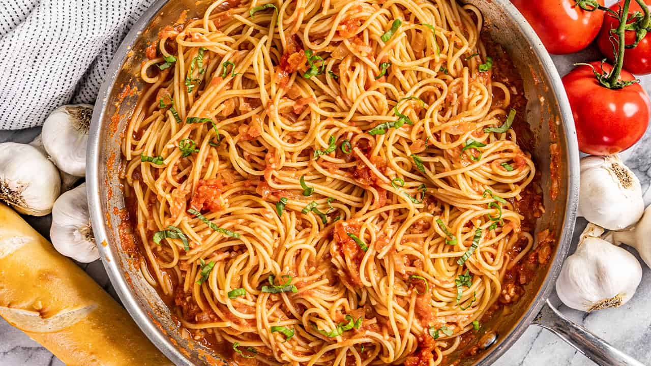 Overhead view of a pan filled with pasta Pomodoro.