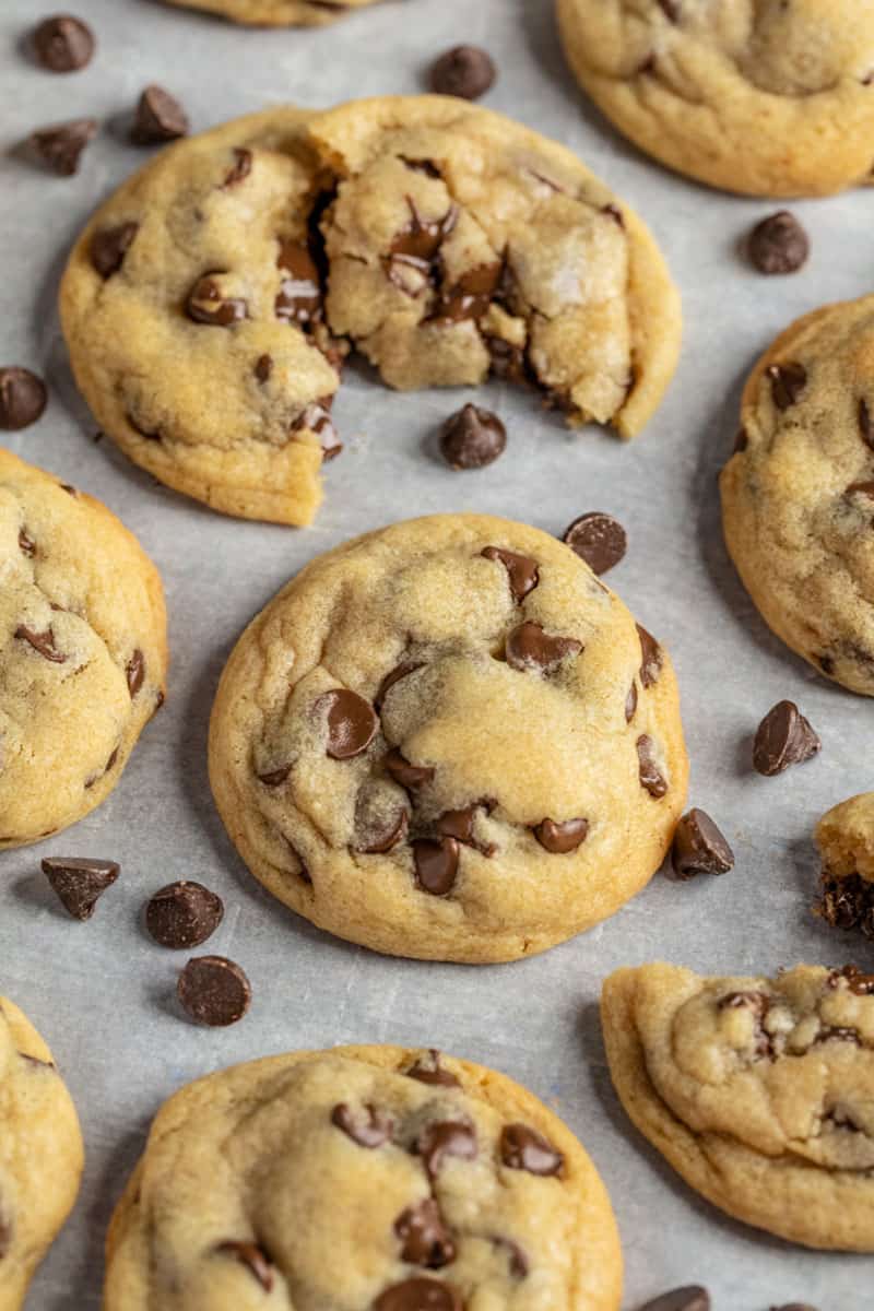 Overhead view of chocolate chip cookies on a baking sheet.