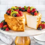 Fresh fruit on top of an angel food cake.