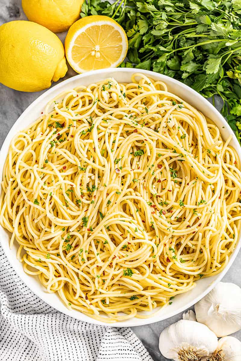 Overhead view of a bowl filled with olive oil pasta.