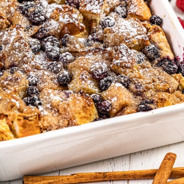 French toast casserole in a white baking dish.