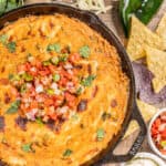 Overhead view of cheesy skillet taco dip.