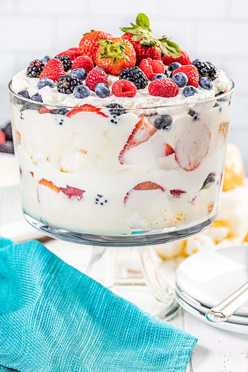 Creamy berry trifle in a trifle dish.