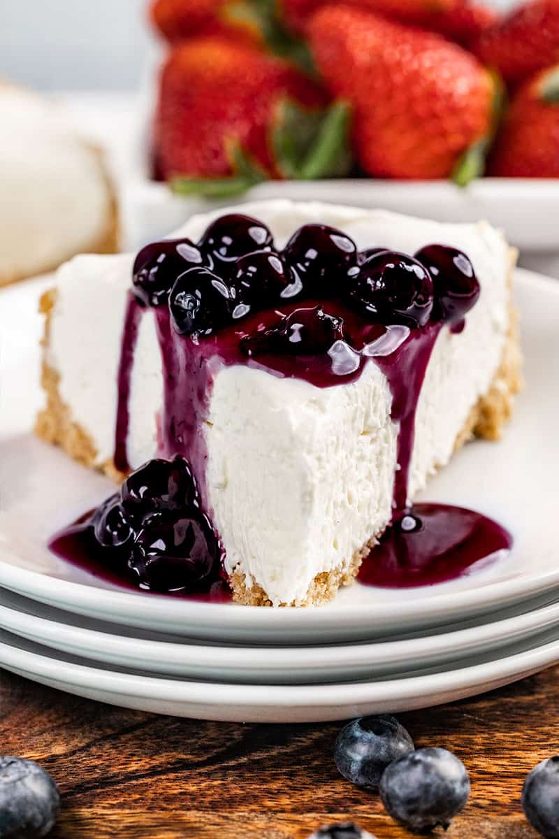 Close up view of a slice of no bake cheesecake.