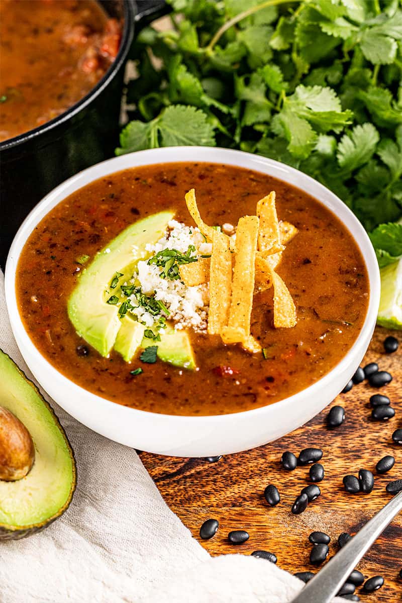 Easy black bean soup in a white bowl.