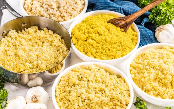 Close up view of couscous in bowls.
