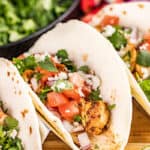 Close up view of chicken tacos.