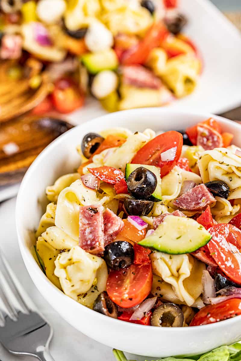 Tortellini pasta salad in a bowl.