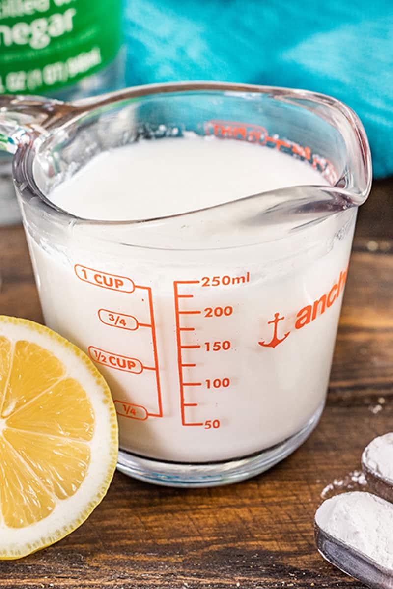 Buttermilk substitute in a glass measuring cup.