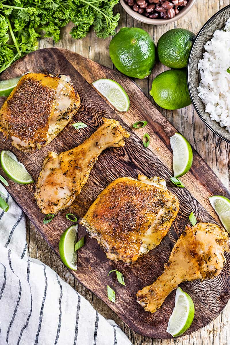 Overhead view jerk chicken thighs and legs on a platter.