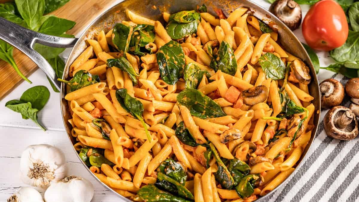 Overhead view of penne rosa in a skillet.