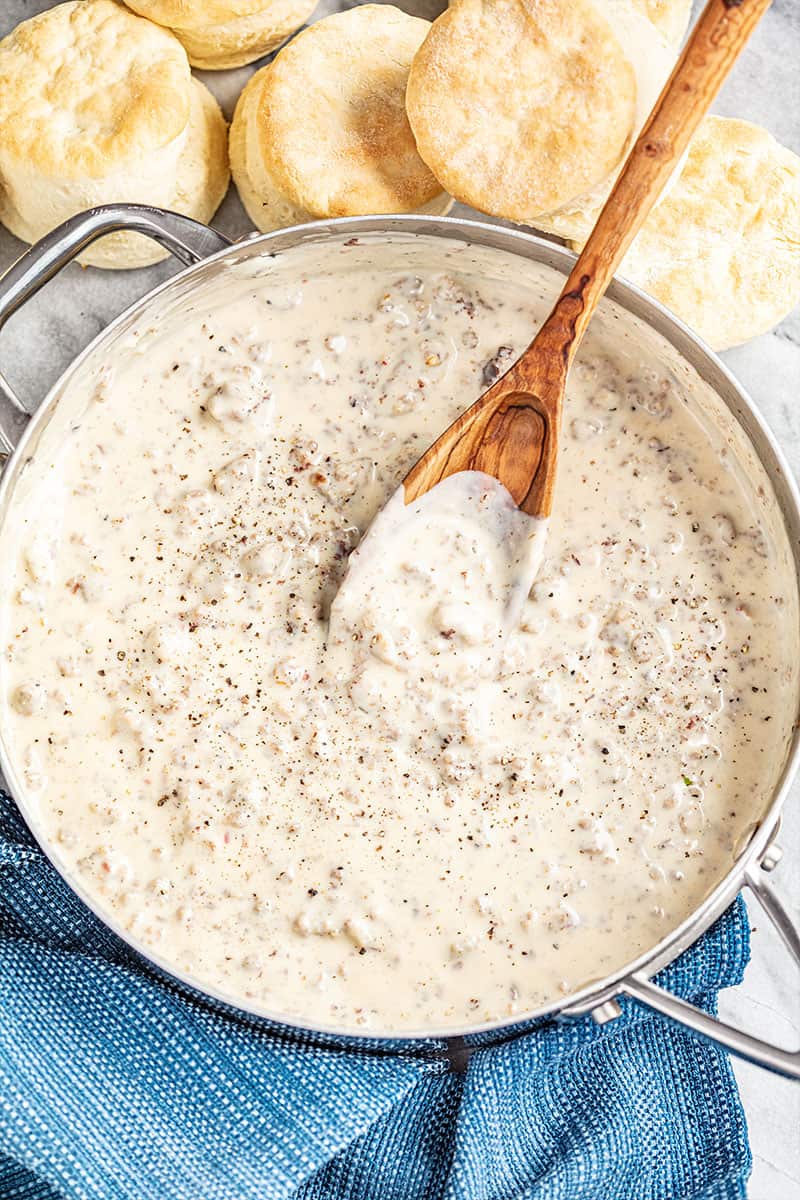 Overhead view of sausage gravy in a pot.