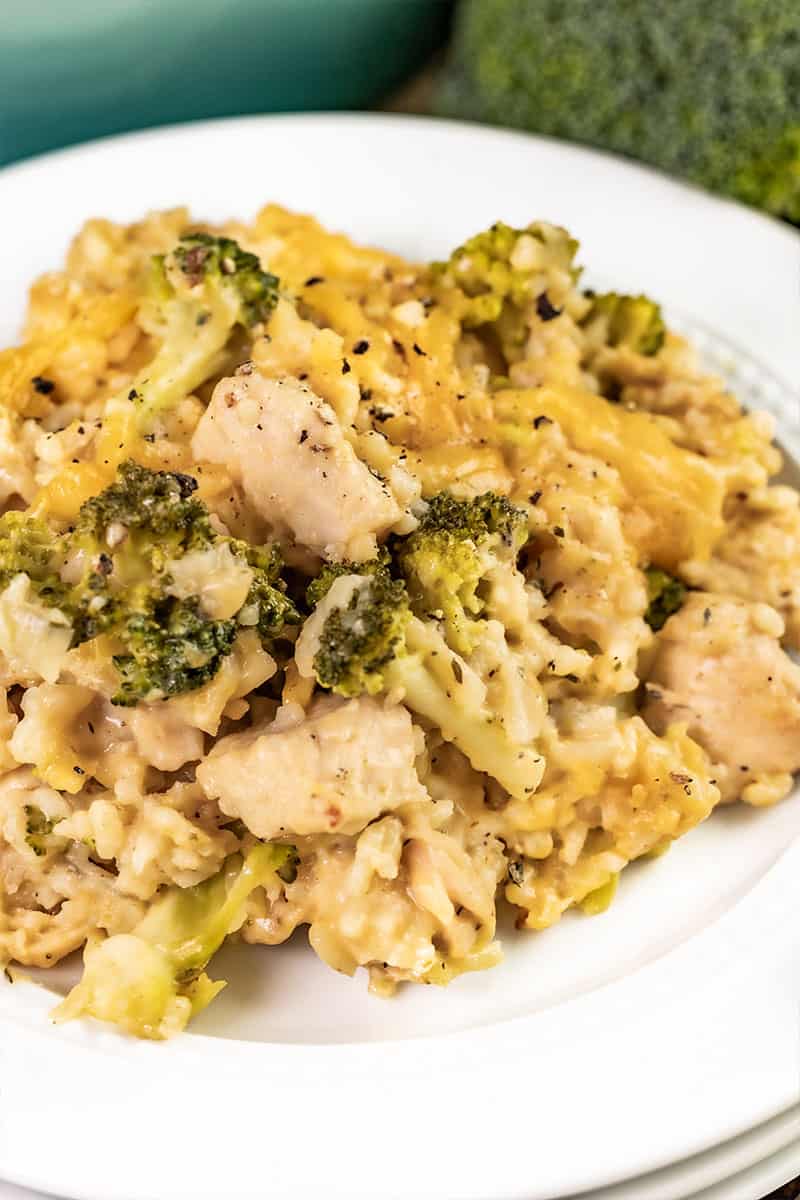 Close up view of creamy chicken broccoli casserole on a plate.