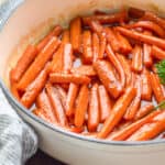 Glazed carrots in a stockpot.