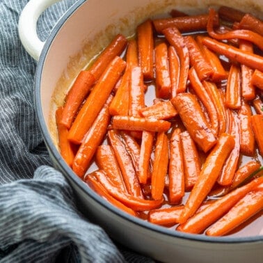 Glazed carrots in a stockpot.