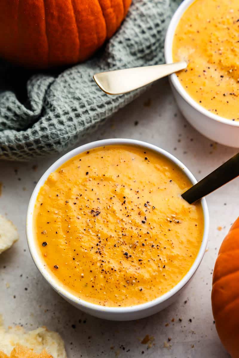 Overhead view of a bowl of pumpkin soup.