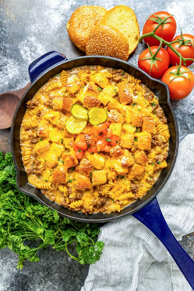 Overhead view of cheeseburger casserole in a cast iron skillet.