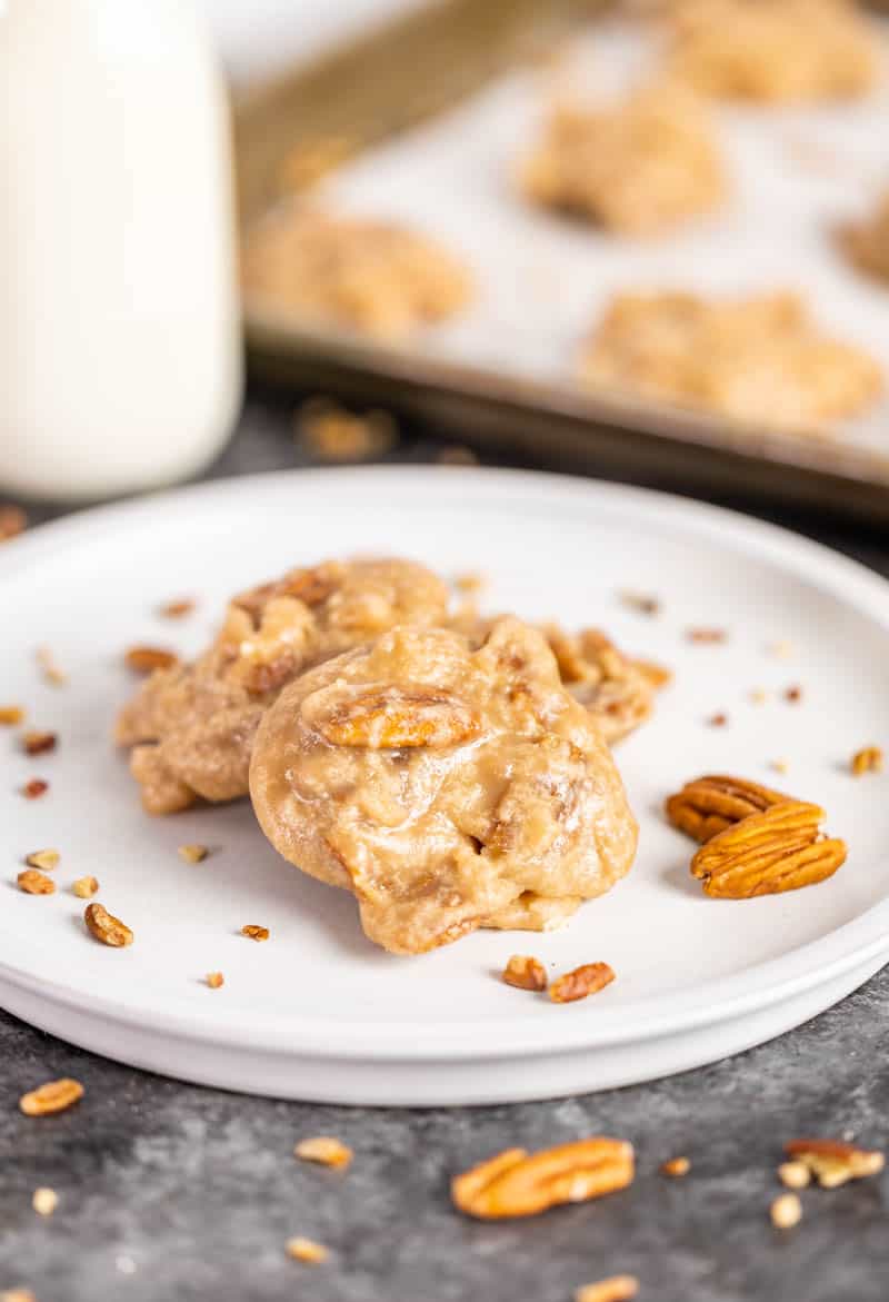 Pecan praline cookies on a white plate.