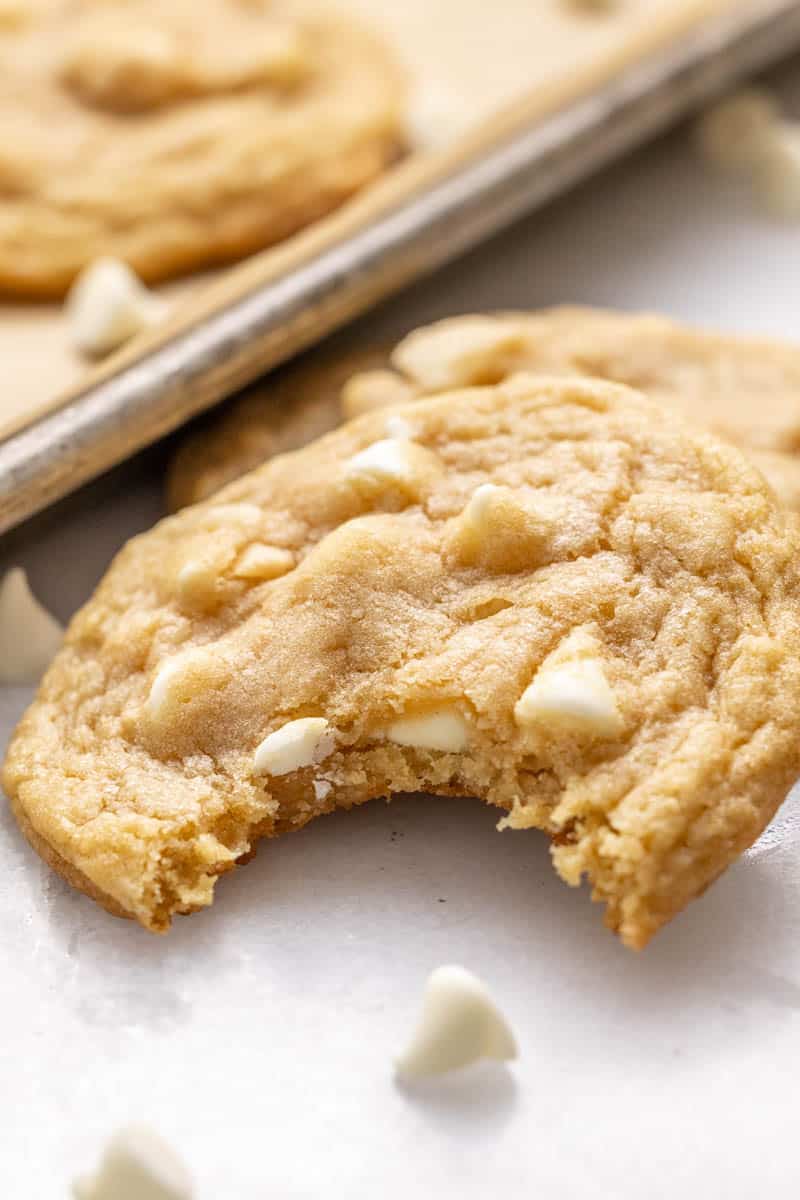 White chocolate macadamia nut cookie on a counter.