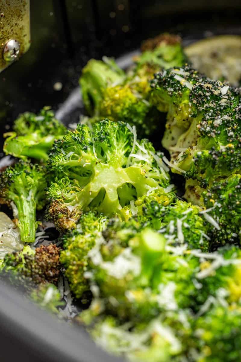 Close up view of air fryer broccoli.