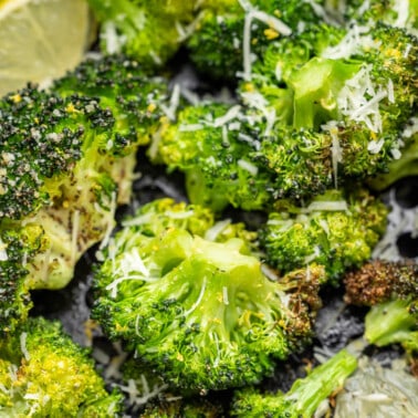 Air fryer broccoli with parmesan cheese sprinkled on top.