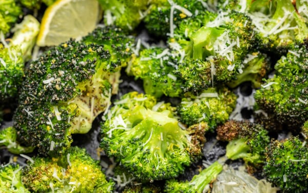 Air fryer broccoli with parmesan cheese sprinkled on top.