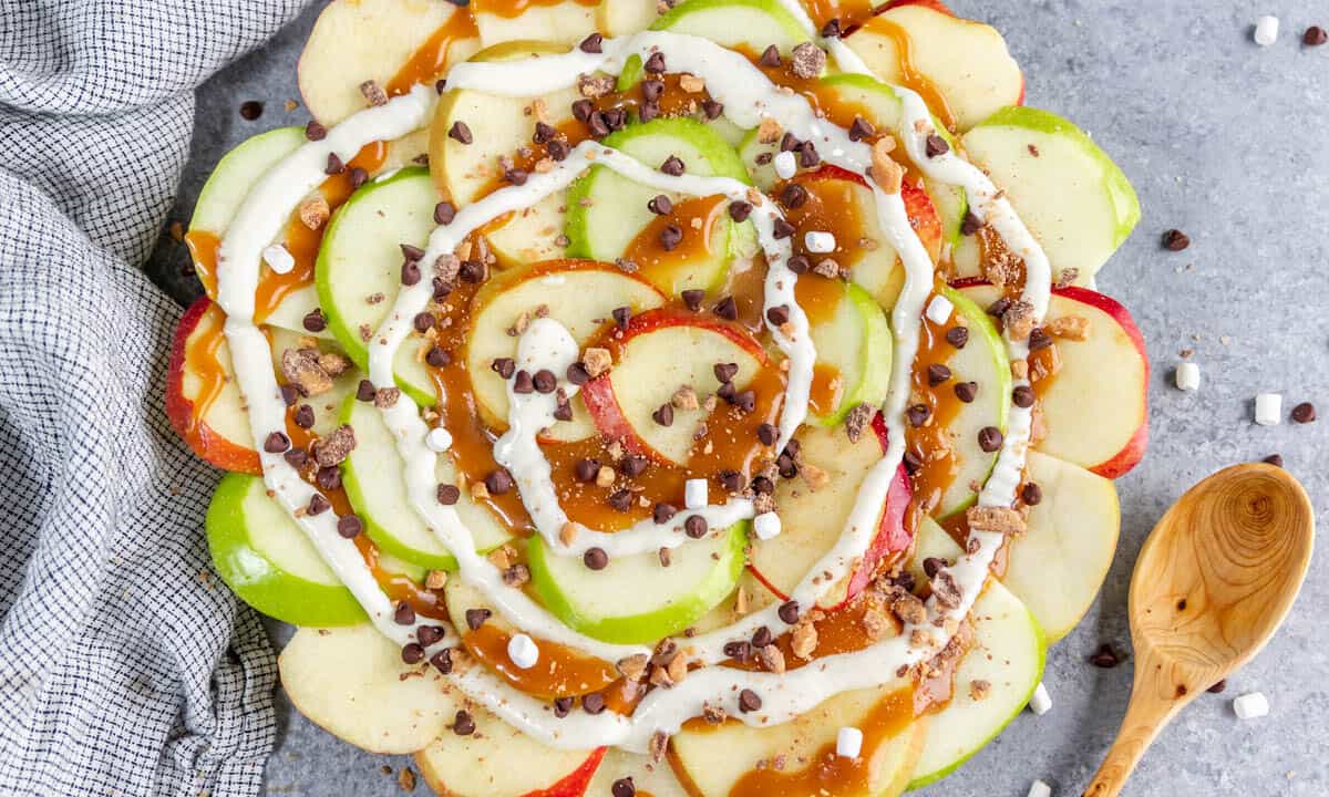 A stack of apple nachos with homemade caramel.